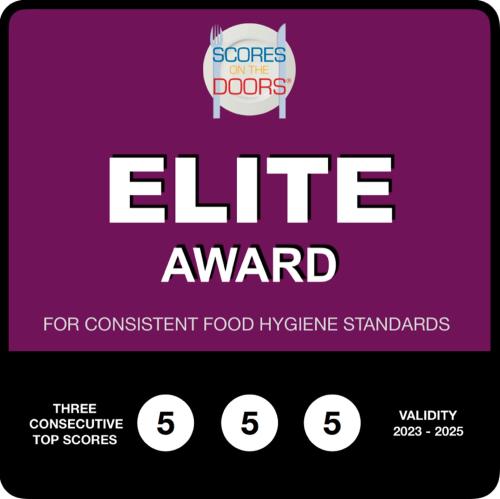 a purple sign with the words elite award on it at Annie's Guest House in South Shields
