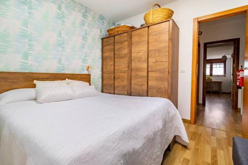 Katil atau katil-katil dalam bilik di Te encantará este duplex en Cóbreces