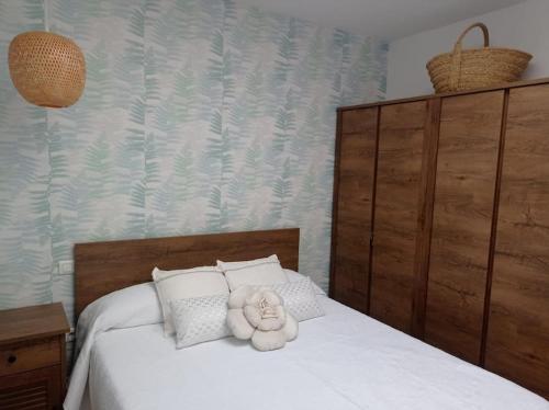 Katil atau katil-katil dalam bilik di Te encantará este duplex en Cóbreces
