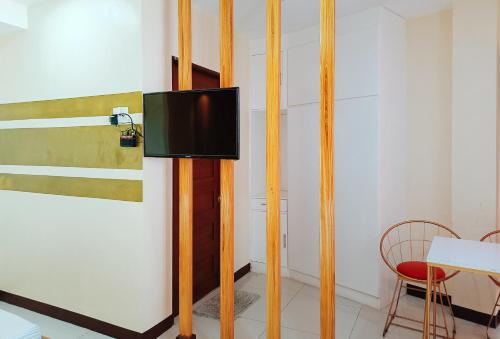 Televízia a/alebo spoločenská miestnosť v ubytovaní Hakysia Hotel
