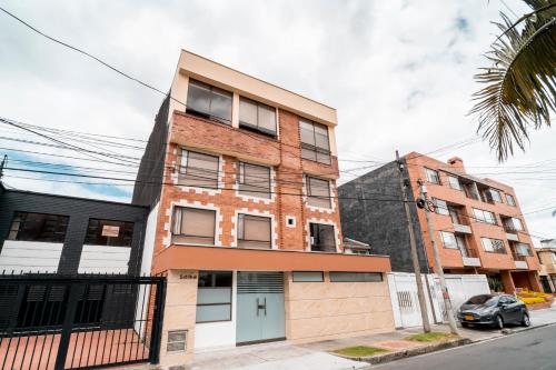 an apartment building on the corner of a street at 100 Wonderful House in Bogotá