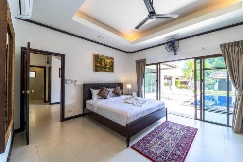 Voodi või voodid majutusasutuse 3 Bedroom Pool Villa in Great Location! BUB toas