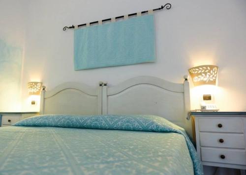 Hotel Club Ragno D'oroにあるベッド