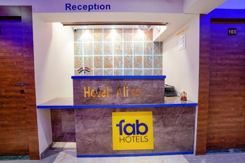 a hotel atlas lobby with a hotel atlas sign at FabExpress Alive in Mumbai