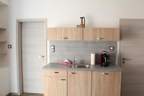 a kitchen with a sink and a counter top at Modernes Ferienhaus in Daun in Daun