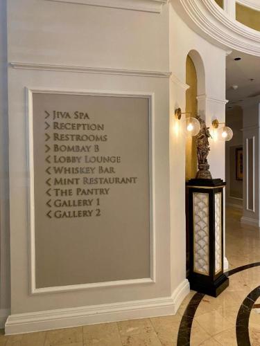 a framed picture on a wall in a hallway at Taj Hotel Cape Town - Taj Residence suites in Cape Town