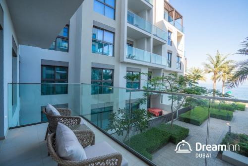 a view of the ocean from the balcony of a building at Dream Inn Apartments - Address Beach Residence Fujairah in Fujairah