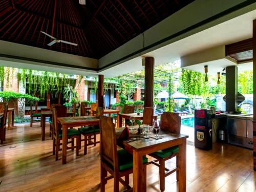 En restaurant eller et andet spisested på Awatara Boutique Resort Ubud