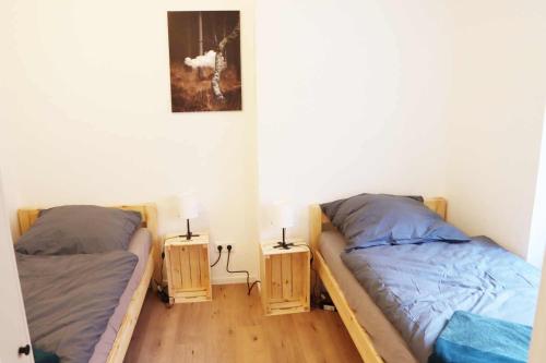 Postel nebo postele na pokoji v ubytování cozy 3-room Apartment