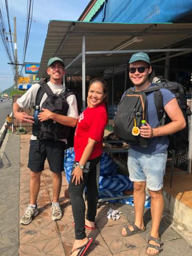 a group of three people posing for a picture at Baansrisuthum in Don Sak