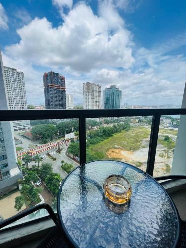 a glass table with a engagement ring on top of a balcony at R&F PRINCESS COVE at ANJU in Johor Bahru