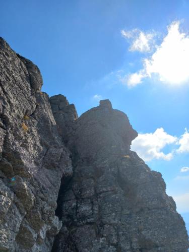 a rocky mountain with a blue sky in the background at Knusperhäuschen Maria Nikoletta in Witra