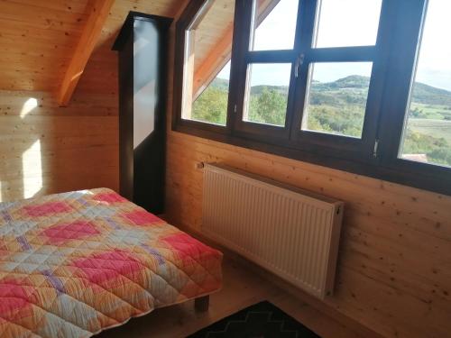 Postel nebo postele na pokoji v ubytování Vikendice Karamarković