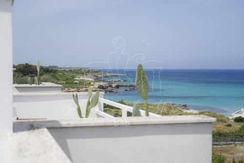 a view of the ocean from the balcony of a house at Balconi sul mare in Otranto