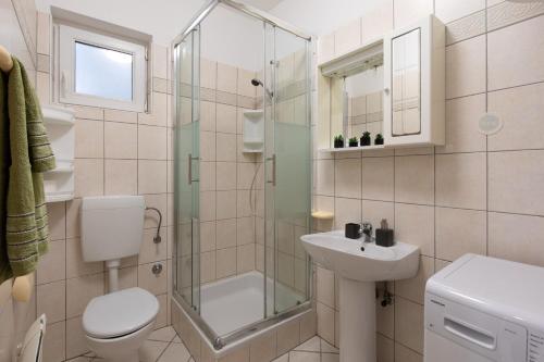 Koupelna v ubytování Apartment Filip