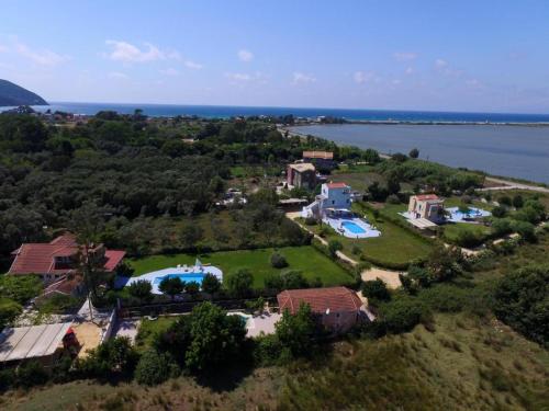 an aerial view of a large estate with a lake at Villa Adonis with private pool by Lefkadastay in Lefkada Town
