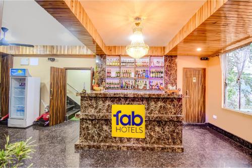 a restaurant with a bar with a sign that reads igloo hotels at FabHotel The Grunge in Gangtok