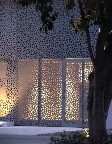 a building with a wall with a pattern on it at Hotel CityFlats in Bogotá