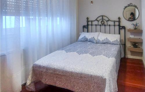 Katil atau katil-katil dalam bilik di Beautiful Apartment In Moaña With Wifi