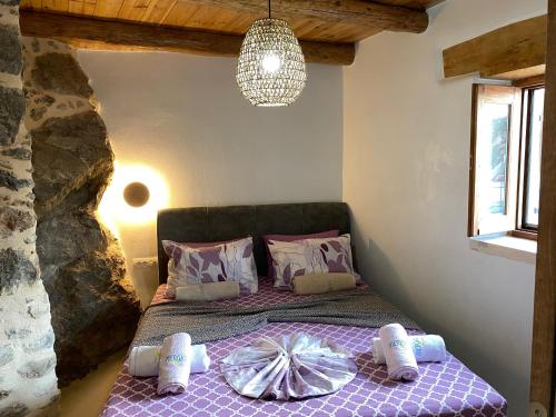 Ένα ή περισσότερα κρεβάτια σε δωμάτιο στο Meraki Apartments Crete