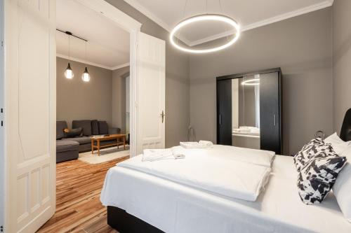 Posteľ alebo postele v izbe v ubytovaní Budapest Lighthouse Apartment