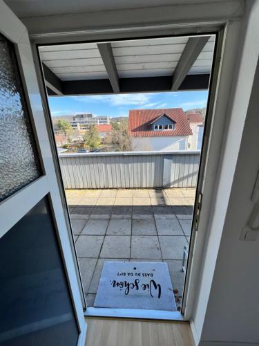 a window with a sign that says my prayers am at KnocksCasa4You 3 Zimmer Wohnung Nr.23 Marburg in Marburg an der Lahn