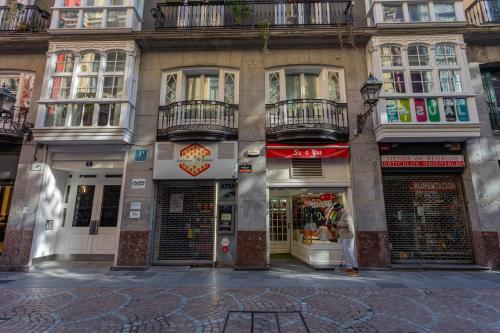 a group of buildings on a city street at Casual Arriaga in Bilbao