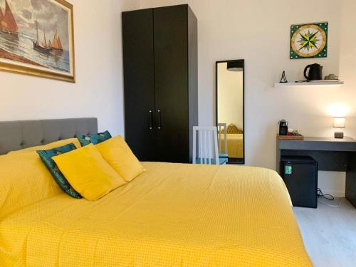 Uma cama ou camas num quarto em Terrazza Capruzzi