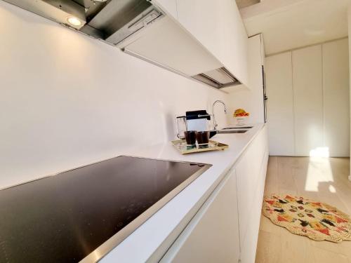 a kitchen with a counter top with a blender at House Casbah Porto Rotondo in Porto Rotondo