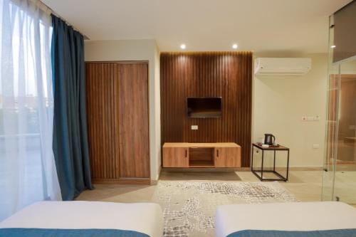 Postel nebo postele na pokoji v ubytování Pyramid Front Hotel