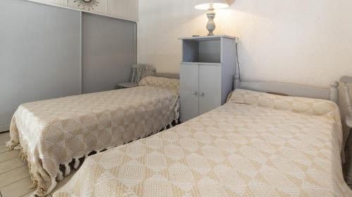 Posteľ alebo postele v izbe v ubytovaní Les Ondines 2- 33- Maison mezzanine- 6 pers