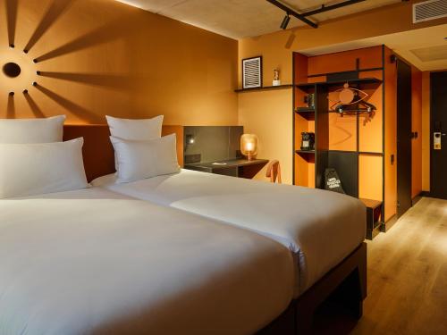 Katil atau katil-katil dalam bilik di Tribe Paris Saint Ouen