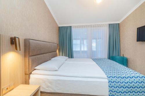 MY HOTELにあるベッド