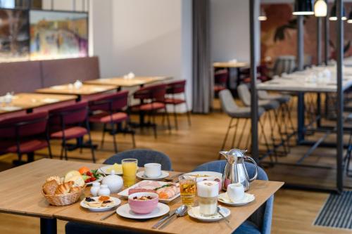 Majoituspaikan Mercure Hotel Berlin Mitte ravintola tai vastaava paikka