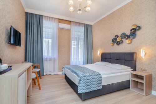 Postel nebo postele na pokoji v ubytování MY HOTEL