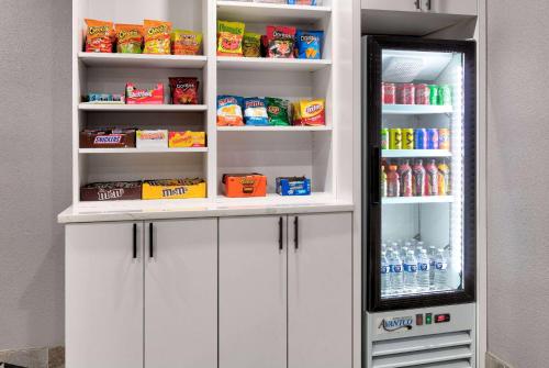 a refrigerator filled with lots of food and drinks at Baymont by Wyndham Chattanooga Eastridge in East Ridge