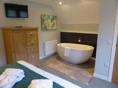 Phòng tắm tại Lord Galloway 37 with Hot Tub