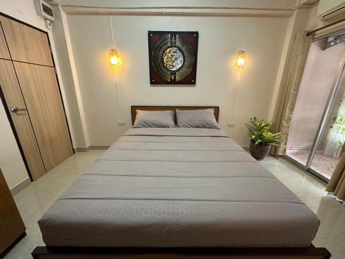 Ένα ή περισσότερα κρεβάτια σε δωμάτιο στο 66 Apartment