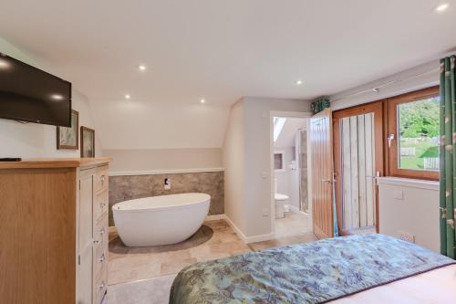 Phòng tắm tại Lord Galloway 38 with Hot Tub