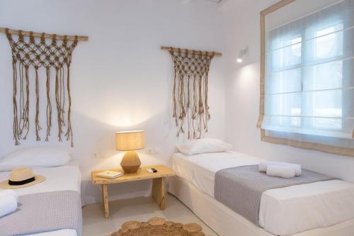 Postel nebo postele na pokoji v ubytování La Mer Residences