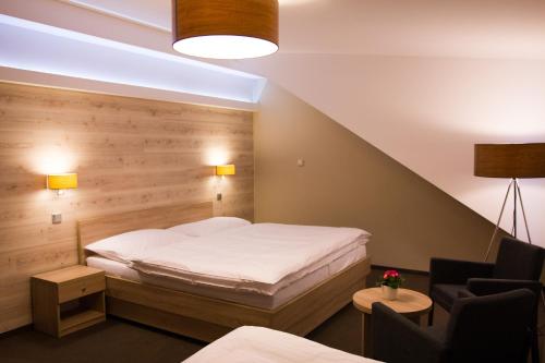 Tempat tidur dalam kamar di Hotel Freud