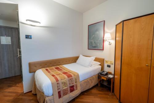 Katil atau katil-katil dalam bilik di Hotel Regina