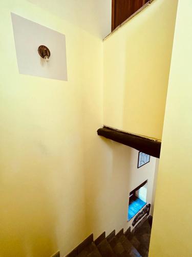 a view of a stairs with a window and a stair case at Podere La Branda in Vetralla