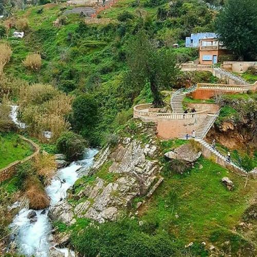 a view of a river on a hill with stairs at Casa Plasa Grande in Chefchaouene