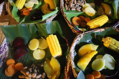 a group of baskets filled with different fruits and vegetables at Moonshade Handapanagala in Monaragala