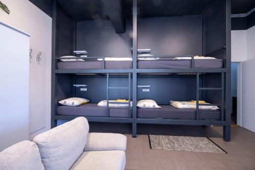 Postel nebo postele na pokoji v ubytování Hostel Limaks Celje