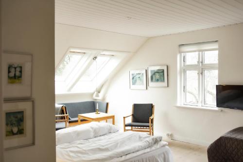 Cama o camas de una habitación en Hotel Aahøj
