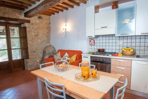 Η κουζίνα ή μικρή κουζίνα στο Appartamento Tabaccaia - Cortona