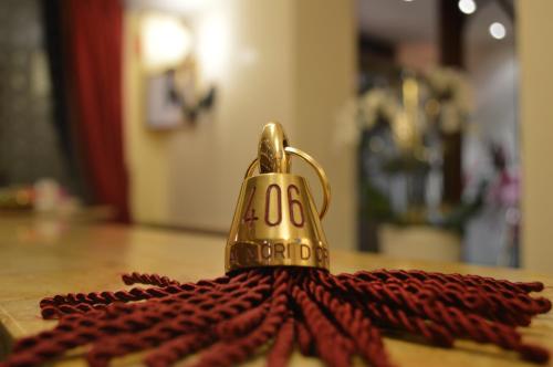 a gold bell sitting on top of a table at Ai Mori d'Oriente in Venice