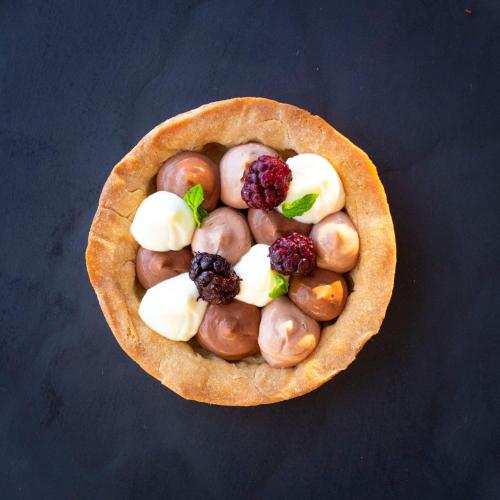 a small pastry with nuts and berries in it at Tenuta San Marcello in San Marcello
